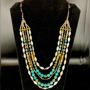 Multi strand necklace with turquoise colored beads N124